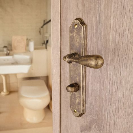 Ouvre&Déco – Poignées de porte CARINA à cylindre – 2 unités – Laiton patiné antique – Entraxe 195 mm – Fonction condamnation/décondamnation