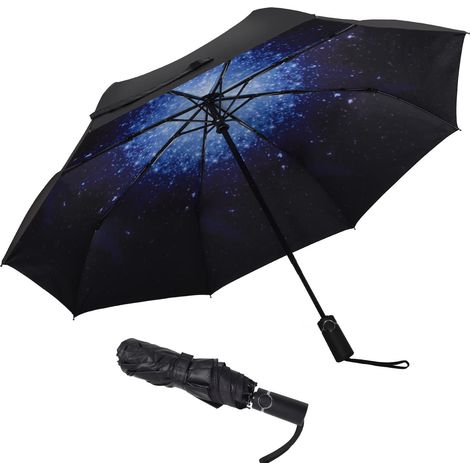 Ombrello parasole in gel blu e nero con motivo cielo stellato.