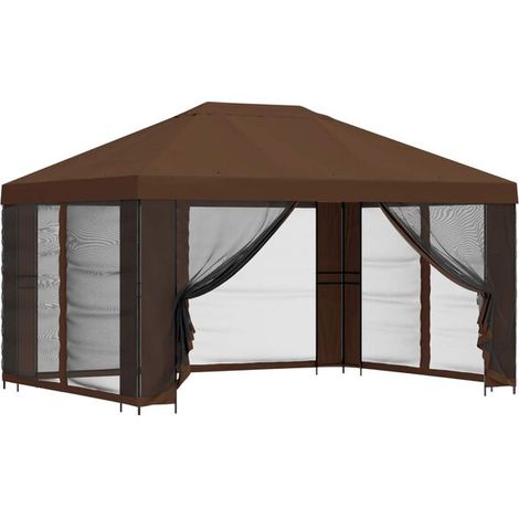 Le chalet de jardin a des murs de 4 x 3 mètres et est fabriqué en fibre de polyester marron et en acier. (1/5)