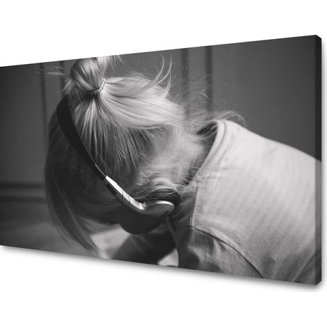 Lienzo impreso con la imagen de una niña con auriculares.