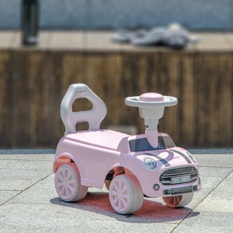 Coche de juguete para niños de 18 a 36 meses con volante, claxon y sistema antivuelco. Capacidad de carga de 25 kg. 53 x 25 x 35 cm. Rosa.