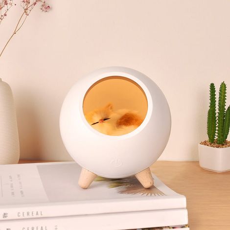 Lámpara de noche blanca con un gatito durmiendo. (1/4)