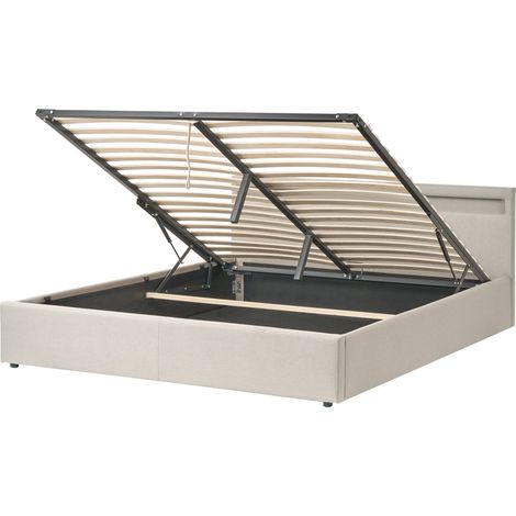 Cama con almacenaje somier de láminas tapizado de tela 180 x 200 cm luces LED multicolores beige Armelle