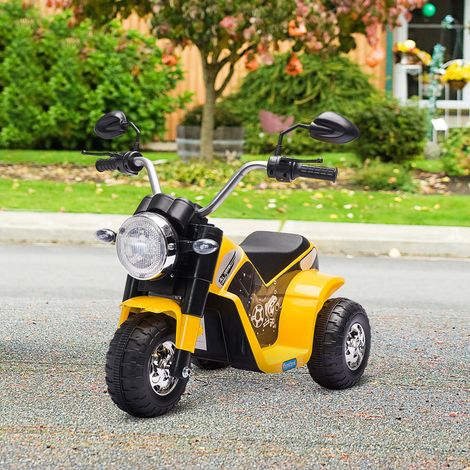 Moto eléctrica de 3 ruedas para niños con luces y sonidos, batería recargable de 6 V, velocidad de 2 km/h, para niños de 18 a 36 meses, 72 cm x 57 cm x 56 cm, color amarillo.