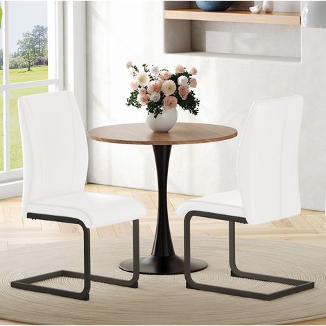 Chaise de salle à manger, dossier ergonomique, coussin en mousse, simili cuir blanc, pieds en métal noir (1/5)