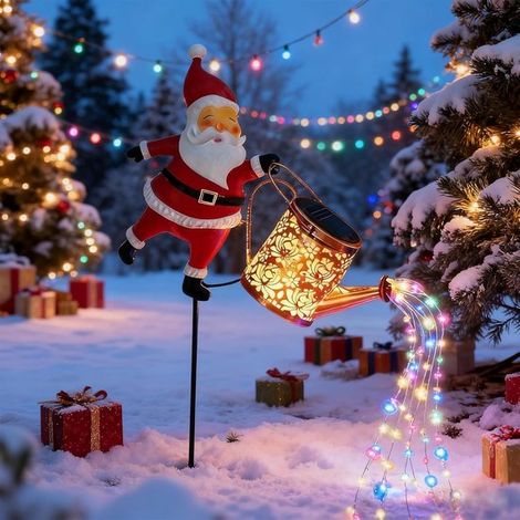 Lampe arrosoir solaire pour le Père Noël. Éclairage décoratif pour jardin et pelouse. Arrosoir étanche avec jet d'eau. (1/5)