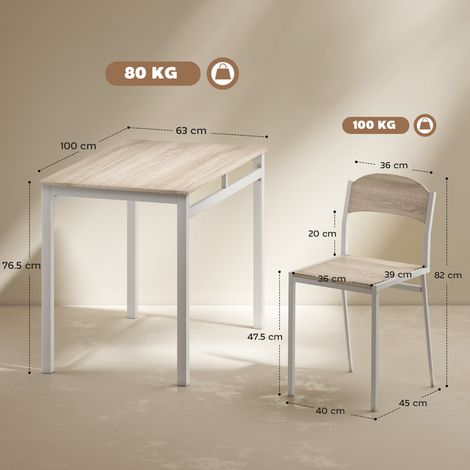 Ensemble de salle à manger cinq pièces comprenant une table rectangulaire et quatre chaises. Fabriqué en métal et MDF, de couleur grise et blanche. (1/5)
