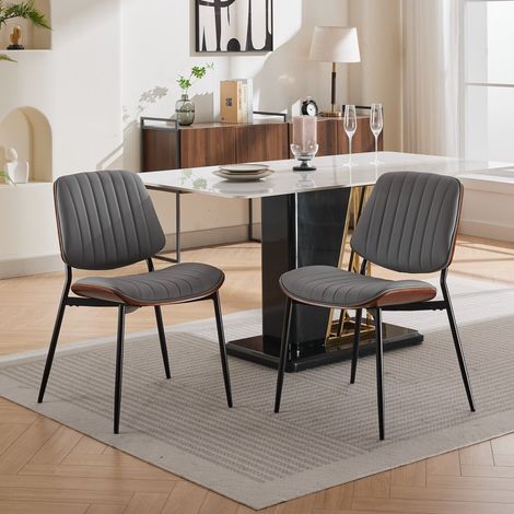 Silla de comedor de estilo mid century, respaldo curvado, patas metálicas cónicas, PU gris (1/5)