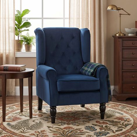 Fauteuil salon capitonné assise large pieds bois classique grand confort 74x86x102 cm bleu foncé. Fauteuil classique pour un salon élégant, confortable et intemporel. (1/5)