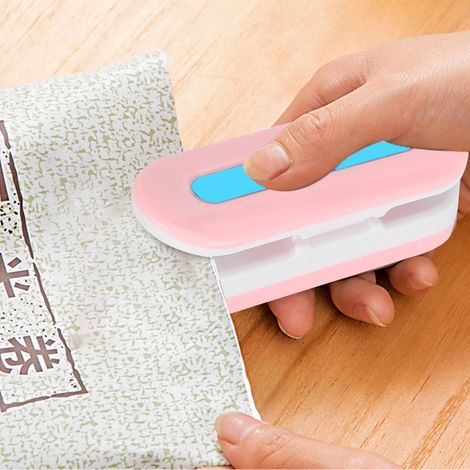 Scelleuse manuelle compacte pour emballage plastique, double fonction rapide et pratique. (1/5)