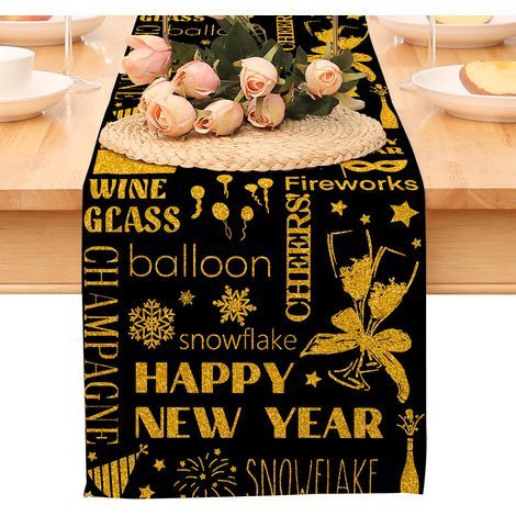 Chemin de table « Bonne année ». nappe noire et or à pois et étoiles. décoration pour la maison et la cuisine. ambiance champêtre. linge de table en toile de jute pour les fêtes d'hiver 2026 (1/5)