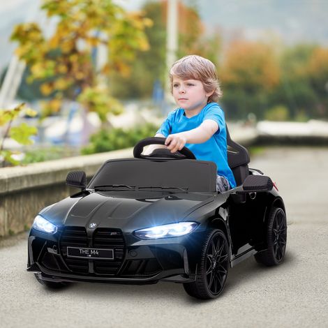 Coche eléctrico de juguete BMW M4 con licencia oficial, 12 V, para niños. Coche eléctrico de juguete con doble motor, suspensión, control remoto 2.4G, claxon y faros. Velocidad máxima: 3-5 km/h. Carga
