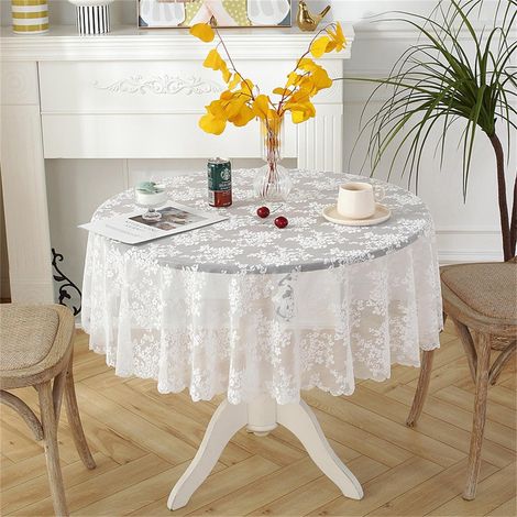 Nappe ronde vintage blanche en dentelle (1/5)
