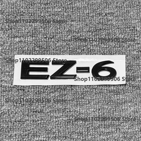 (EZ6, carbone) - Accessoires extérieurs en ABS noir argenté pour voiture Mazda : autocollant logo/lettre pour coffre. (1/5)