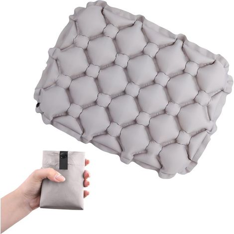 Coussin de siège gonflable gris portable, compact et portable, un accessoire indispensable pour la randonnée et les voyages. (1/5)