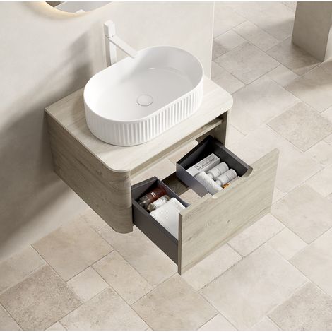 Meuble de salle de bain suspendu 60 cm avec vasque ovale en céramique et plateau travertin (1/5)