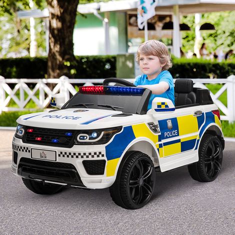Voiture de police électrique pour enfants, 12 V, avec télécommande, sirène, gyrophares et connexion USB pour la musique, 110 x 68 x 52 cm, blanche. (1/5)
