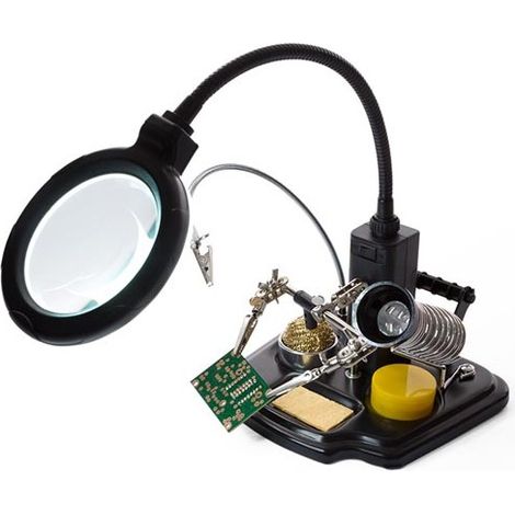 Troisieme main avec loupe et outils de soudage