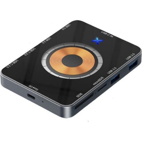 Questo hub USB-C 10 in 1 supporta la ricarica wireless rapida da 15 W e dispone di due lettori di schede, consentendo una connessione efficiente a telefoni e computer. (1/3)