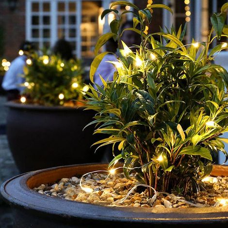 Luci decorative a stringa da 10 m / 32,8 piedi con 100 LED a batteria, 8 modalità di effetti luminosi con telecomando, impermeabili IP44, luce bianca calda. (1/5)