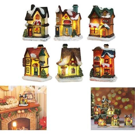Battery-powered Christmas village houses with miniature LED lights - Animated and glowing figurines for holiday decor.