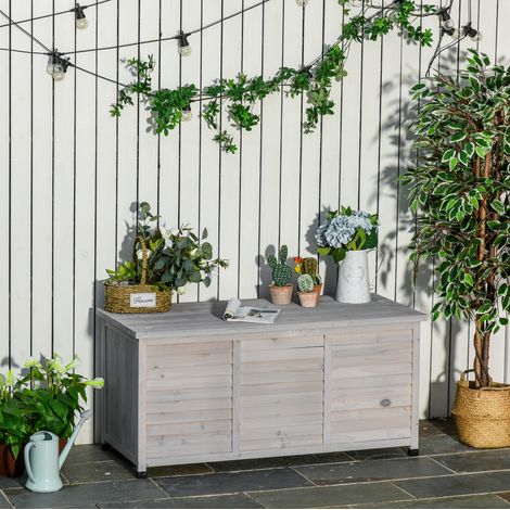 Caja de almacenaje de jardín 127x56x60 cm gris claro en madera con tapa abatible y diseño ventilado (1/5)