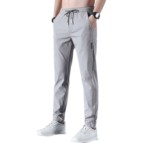 Schnelltrocknende, dehnbare und atmungsaktive Sporthose für Herren, ideal zum Laufen und Joggen. Mit Kordelzug im Bund und Taschen. Größe M – Grau (1/5)