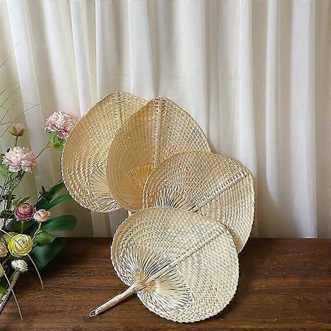 Éventails artisanaux en paille tressée, style bambou, pour rafraîchir l'été et décorer la maison.