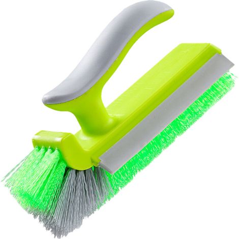Strumento per la pulizia degli angoli, in plastica, di colore verde.