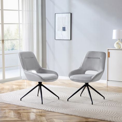 Lot de 2 fauteuils pivotants 360° en velours gris clair, piètement métallique noir laqué, assise respirante, parfaits pour salle à manger contemporaine. (1/4)
