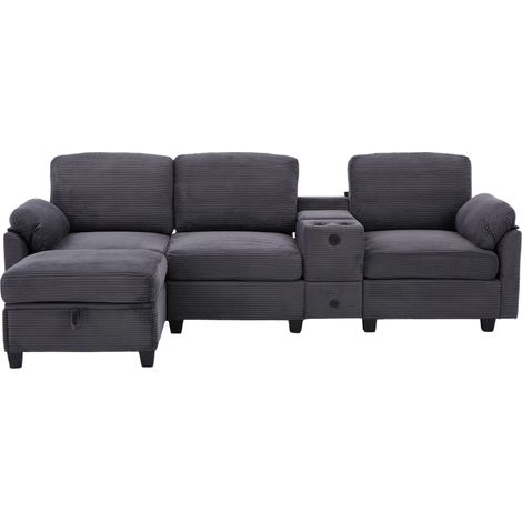 Großes Cord-Sofa mit Komfortschaum. Ausstattung: Abnehmbare Mittelkonsole (2 Cup-Halter + Stauraum), USB-C-Anschluss, Seitentasche, Stauschublade, beweglicher Stau-Ottoman. Für Komfort und Funktion.