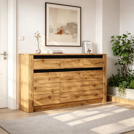 Buffet 135x35x70cm en panneaux de particules, commode contemporaine pour séjour, meuble de rangement à 9 casiers, étagère d'appoint teinte chêne naturel avec 3 tiroirs et niches. (1/5)