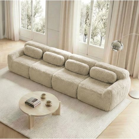 Divano modulare 4 posti in tessuto plush kaki chiaro, senza struttura, con pouf collegabile e base antiscivolo (1/5)