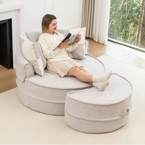 Fauteuil lounge rond 121x107x42 cm gris en mousse avec ottomane et 5 coussins (1/5)