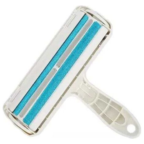 Brosse Anti-poils d'animaux et peluches avec réservoir. (1/4)