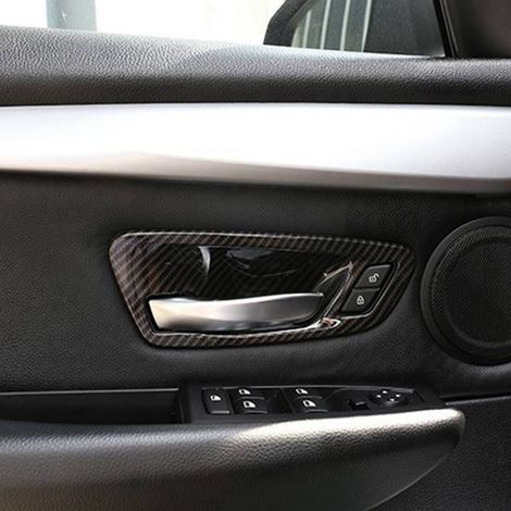 1 set of stickers for the interior door handles of cars made of ABS with carbon fiber texture, suitable for car interiors.--BIEMMEDUE (1/5)
