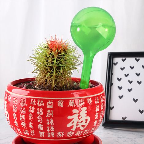 Arroseur automatique pour plantes Arrosage goutte à goutte en PVC transparent 13x5cm idéal pour vacances et jardinage intérieur extérieur (1/5)