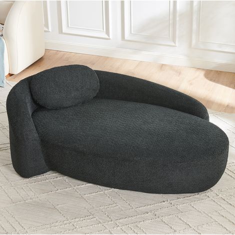 Divano nero in teddy con cuscino, design arrotondato, soffice e compatto (1/5)