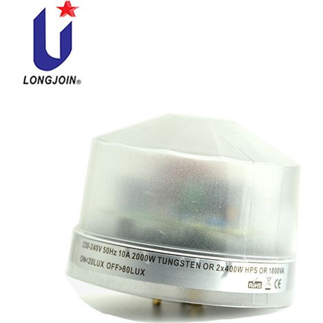 LED streetlights and outdoor lighting fixtures with external British standard rotary lock light controllers, streetlight light controllers, and motion-sensor switches. (1/5)
