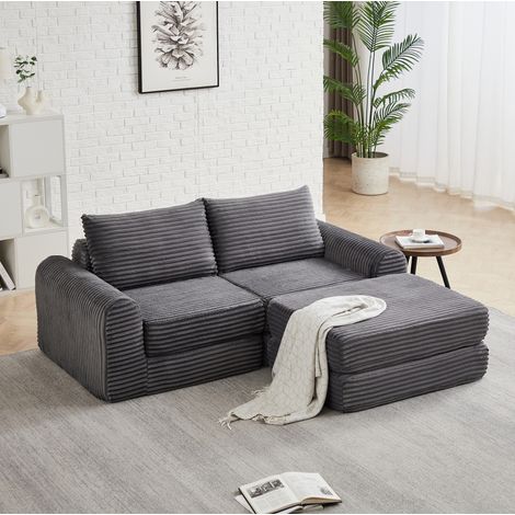 Canapé convertible modular de pana gris con reposapiés extraíble y brazos curvos (1/5)