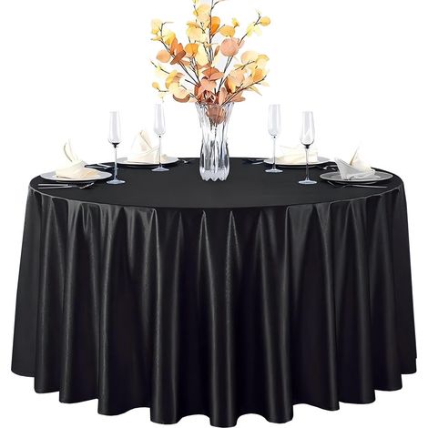 Cette nappe ronde au toucher soyeux est idéale pour les restaurants, les mariages et toutes sortes de réceptions. Noire, diamètre 228 cm