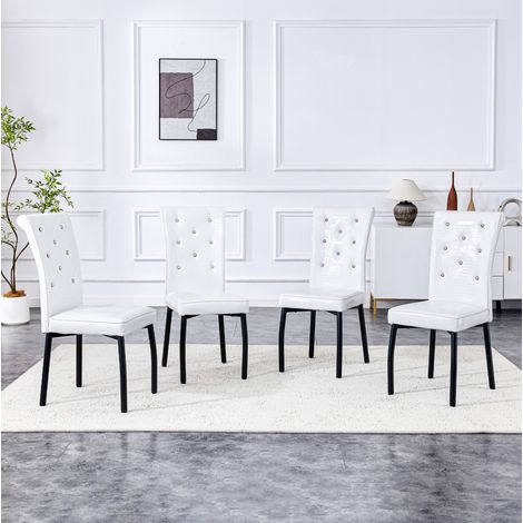 Juego de sillas de comedor de PVC negro y blanco con patas de metal y detalles de botón de cristal (1/5)