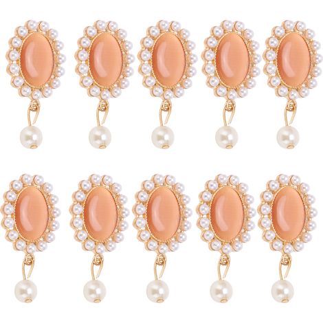 Broche couronne ornée de 10 strass et d'une perle d'opale à six pétales. Convient pour les vêtements, chaussures, sacs et accessoires pour cheveux. 2,3 x 4,5 cm. Perle d'opale orange.