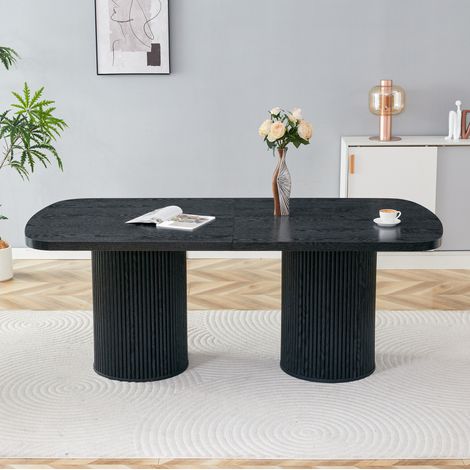 Tavolo da pranzo 180x90x76 cm nero in MDF con base scanalata e design ovale (1/5)
