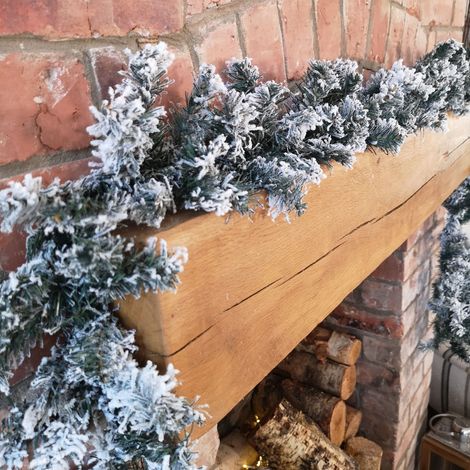 9ft (2.7m) Christmas Snow Flocked Woodcote Fir Garland (1/5)