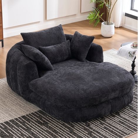 Fauteuil chaise longue intérieur en tissu noir, assise profonde et coussins moelleux, siège lounge confortable pour salon, chambre ou coin lecture, sans montage – CHICFURN (1/5)