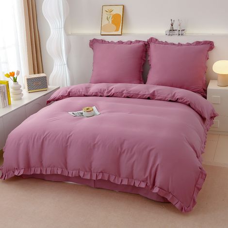 Juego de ropa de cama de algodón premium de 160x200 con volantes rosas.