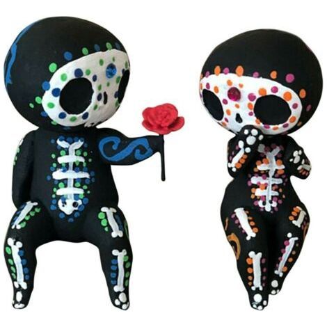 e of decorative resin figurines representing a couple of skulls, decorative object for interior (1/5)