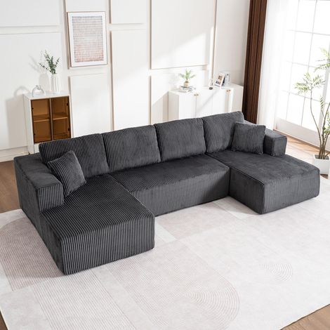 Le salon comprend un canapé sans ossature apparente — un canapé lounge moderne en forme de U — ainsi qu'un canapé et une méridienne modulables et non assemblables, (1/5)