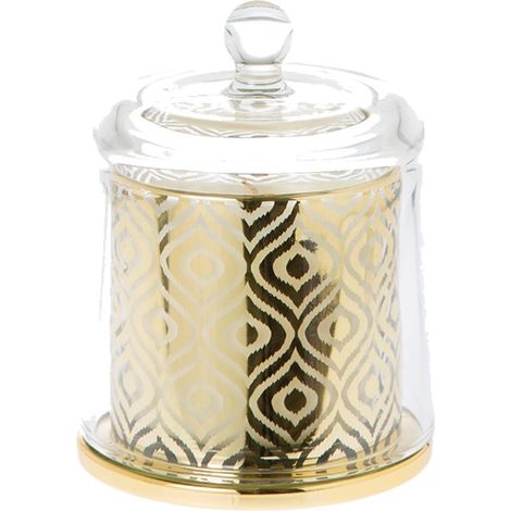 Cloche de verre cachant une bougie décorative